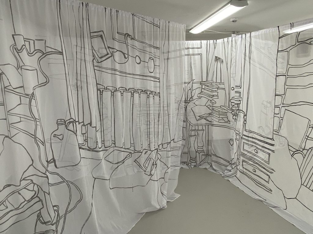 Large immersive installations on net curtains and cotton of everyday domestic scenes