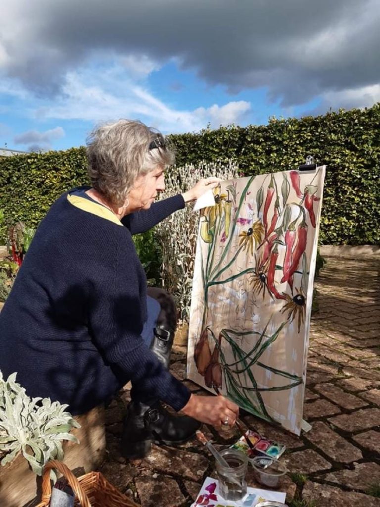 Gabrielle painting outdoors